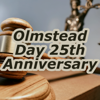 Background of a gavel on a desk with the words Olmstead Day 25th Anniversay
